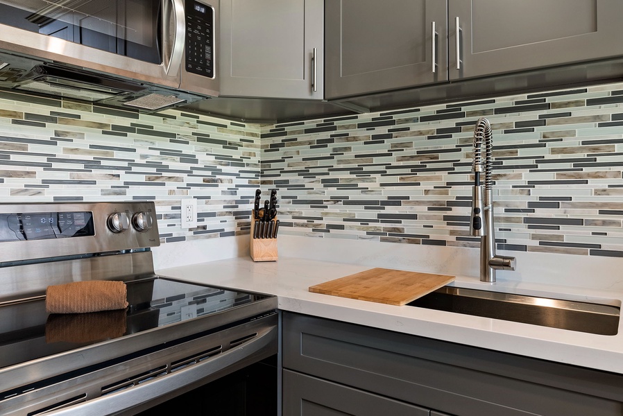 Custom tile backsplash in the remodeled kitchen.