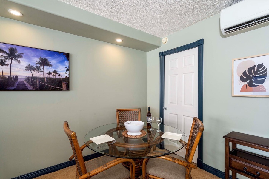 Sleek dining area with table for four.