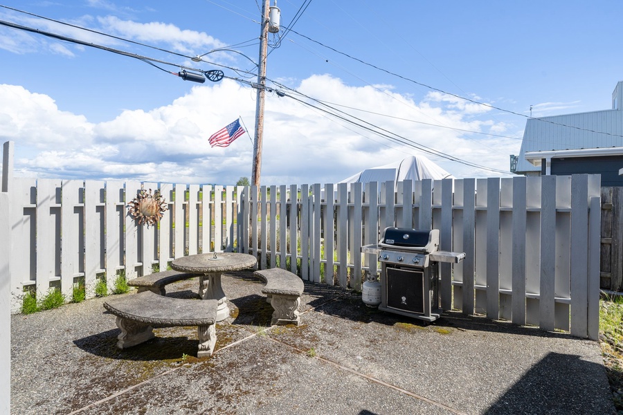 A barbeque grill and dining area for evening meals.