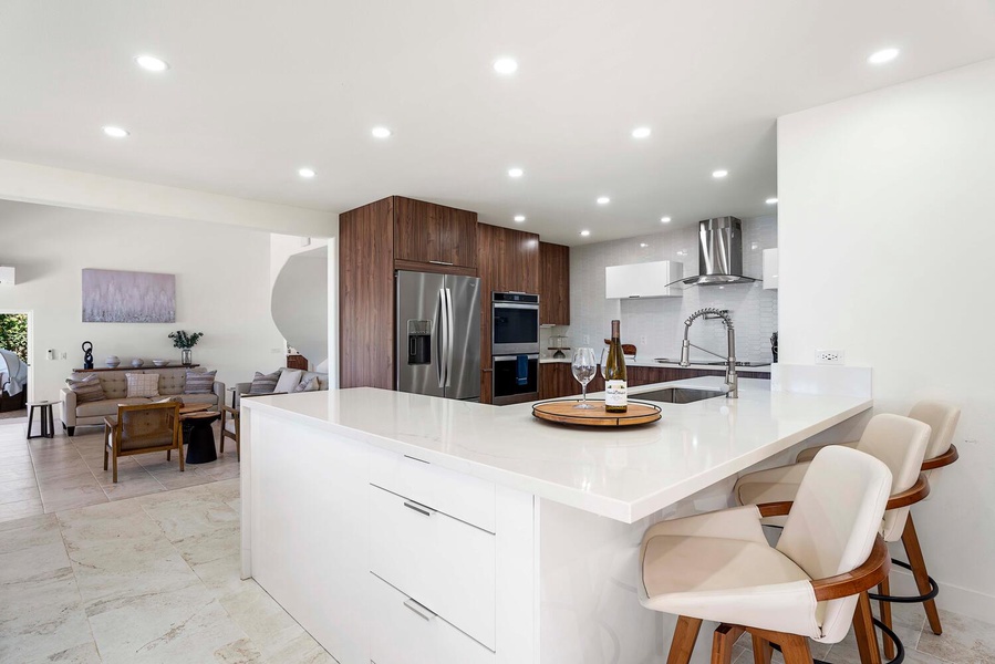 Kitchen island/bar for quick meals and entertainment.