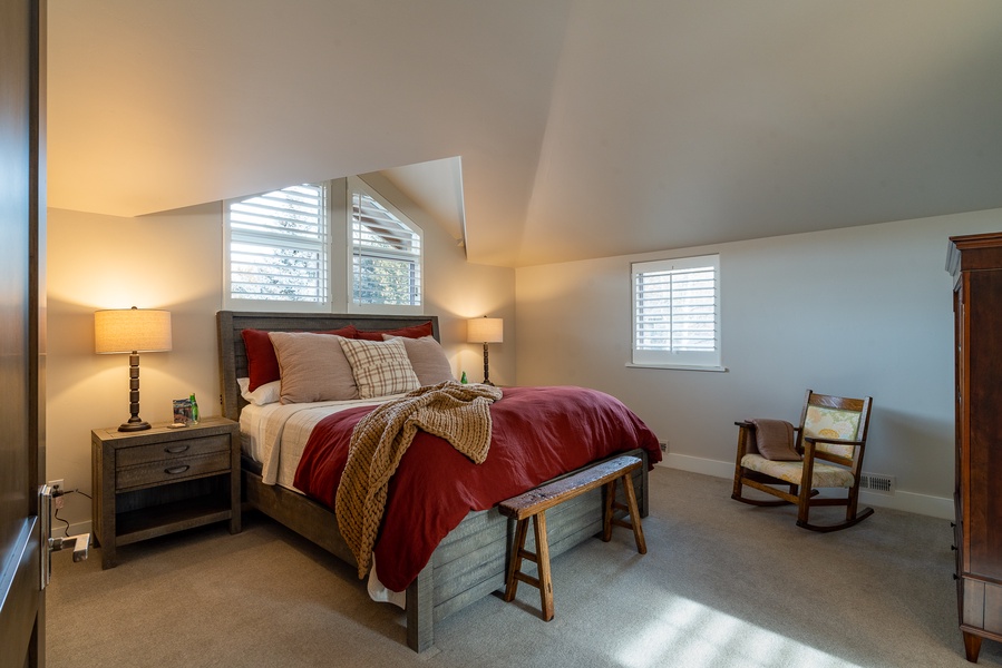 The upper level houses two additional bedrooms, each boasting king-size beds, en-suite bathrooms, and all the comforts you'd expect.