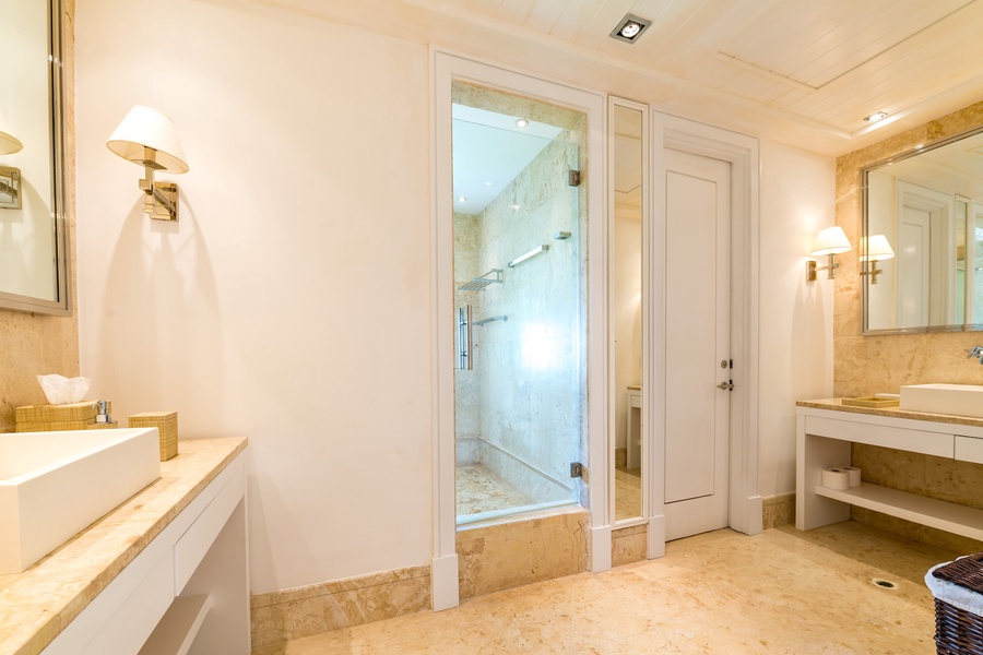 Spa-like ensuite bathroom, complete with a spacious shower and elegant fixtures.