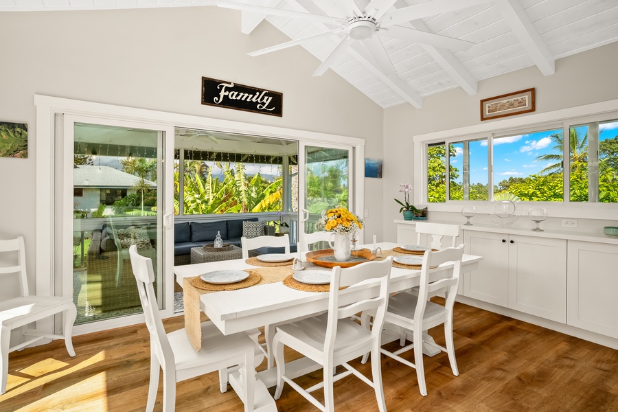 The dining area offers an effortless blend of comfort and tropical views.