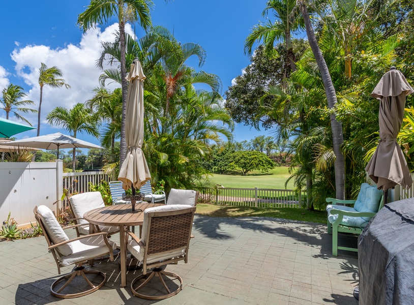Step onto your private lanai paradise, where tropical palms frame golf course views and comfortable seating awaits your morning coffee.