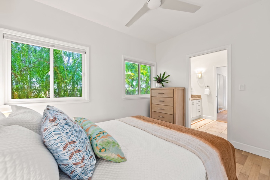 Relax in this light-filled guest bedroom with a breezy island feel.