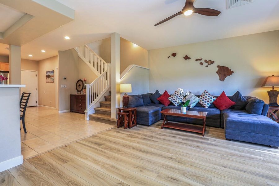 Flush with a spacious living room and floor to ceiling windows with direct access to the wrap-around lanai.