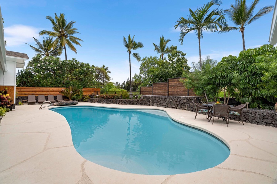 Lounge poolside with a cold drink!