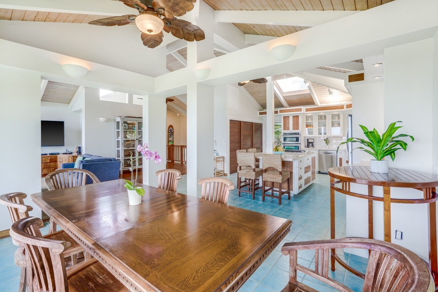 Culinary elegance meets airy spaciousness in our kitchen, boasting high vaulted ceilings and an inviting dining area for six.