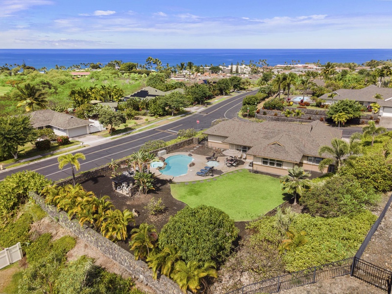 Nature and sea meld in this stunning aerial view of the neighborhood.