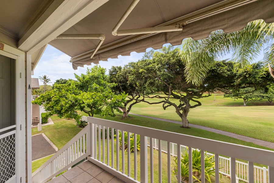 Step onto your private lanai and soak in stunning golf course views beneath swaying palms and mature tropical trees.