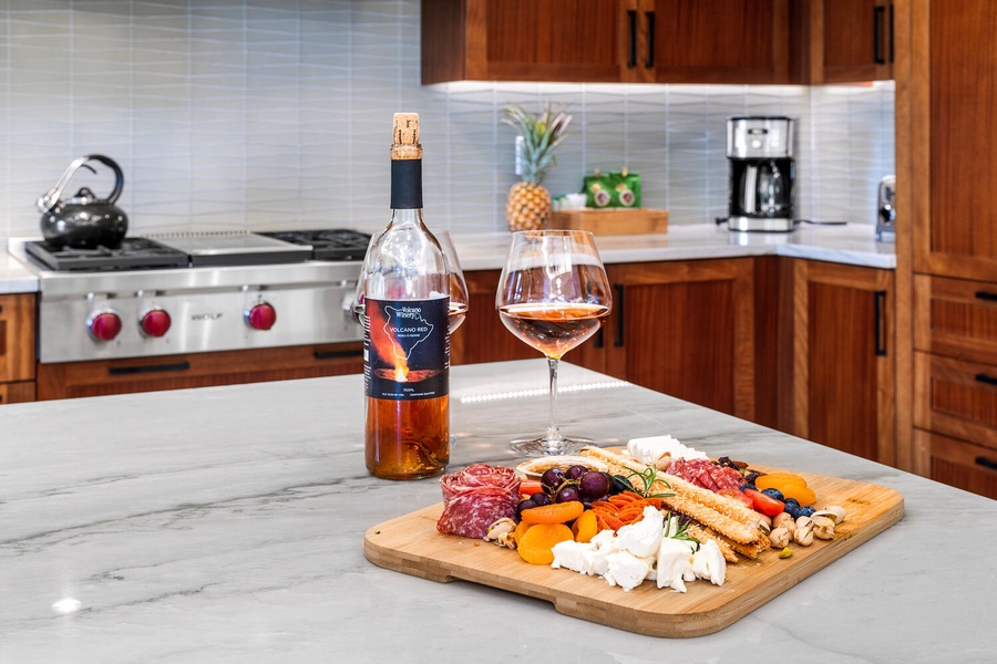 Pair charcuterie and cocktails in this chef-ready kitchen with stone counters.