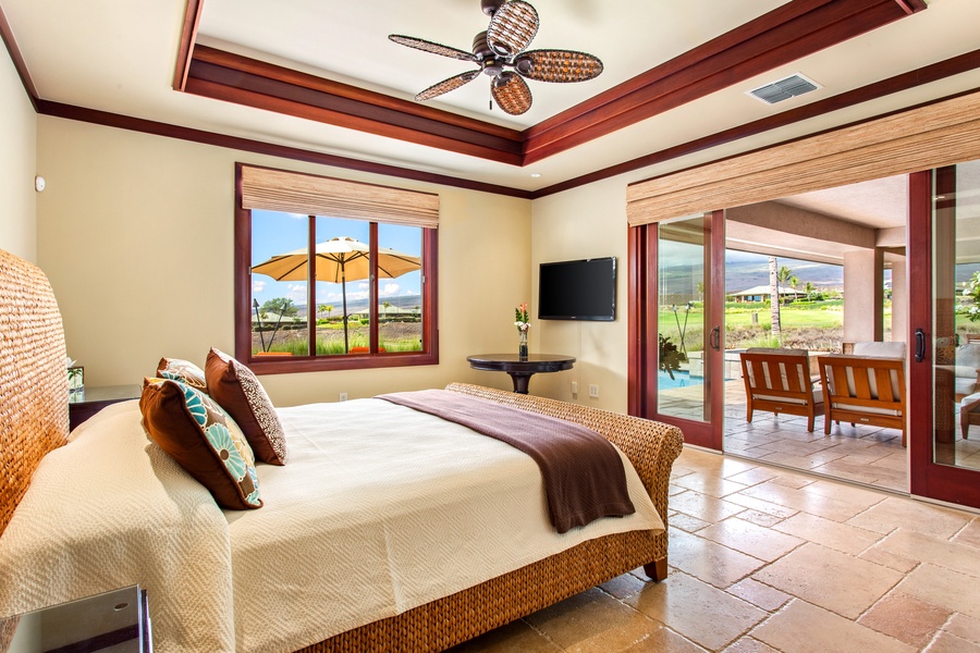 Wake up to mountain and golf course views from this spacious king suite with lanai access.