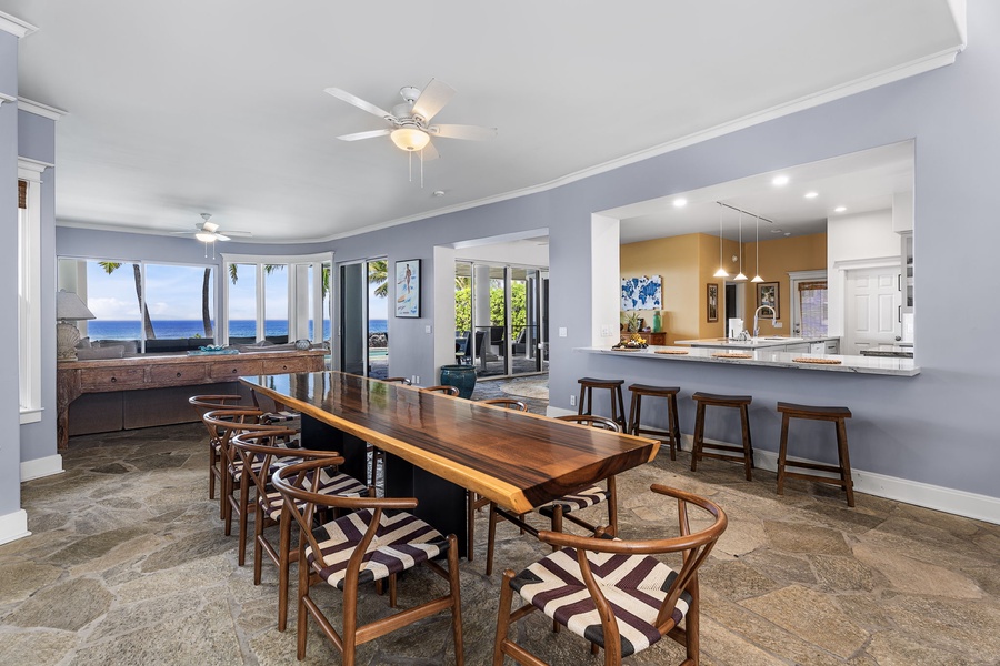 Enjoy open sightlines and spacious flow from the dining room to the living and kitchen areas.