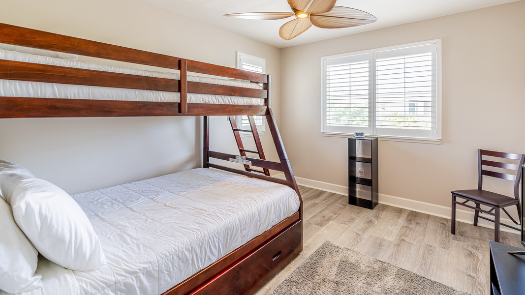 The third guest bedroom is bright and spacious.