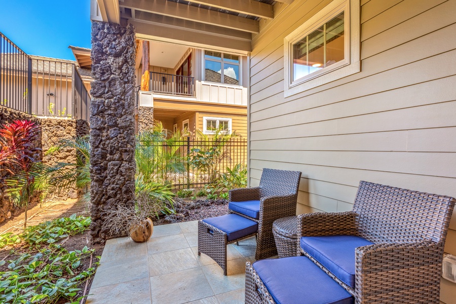 Private outdoor seating area off second bedroom.