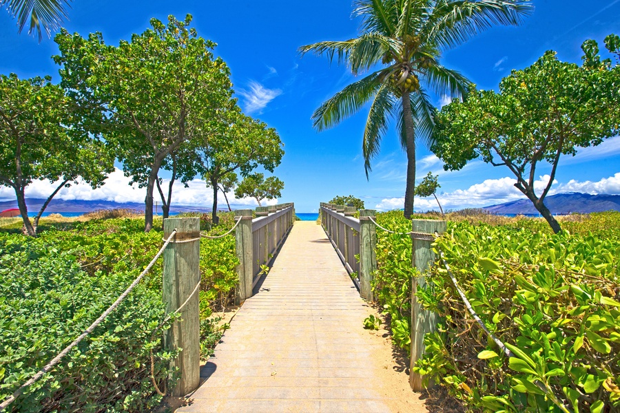 Follow a scenic path from Honua Kai Resort, leading you directly to the beach.
