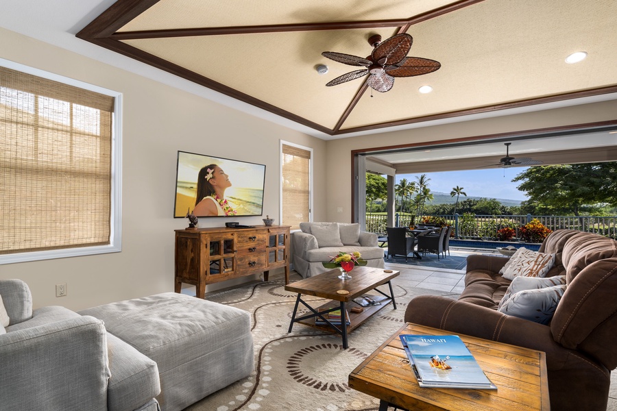Spacious living room opens directly to the lanai—perfect for indoor-outdoor lounging after beach days.