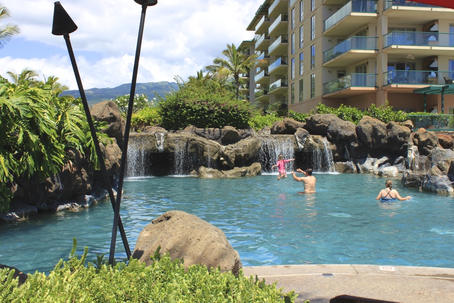 Family-friendly lagoon pool with waterfalls near Honua Kai Konea 204—perfect for all ages.