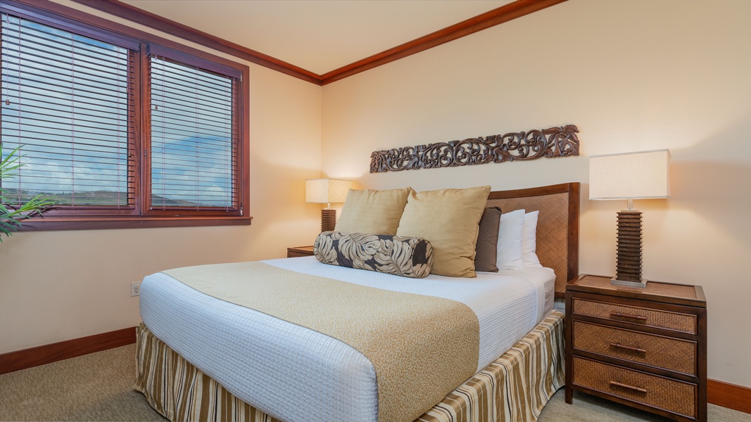 The primary guest bedroom has majestic mountain views.