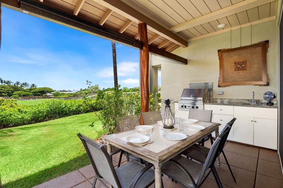 The covered lanai has al fresco dining and Built in BBQ.