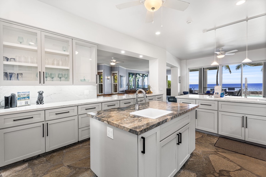 Oversized island offers plenty of prep space and room for multiple chefs.