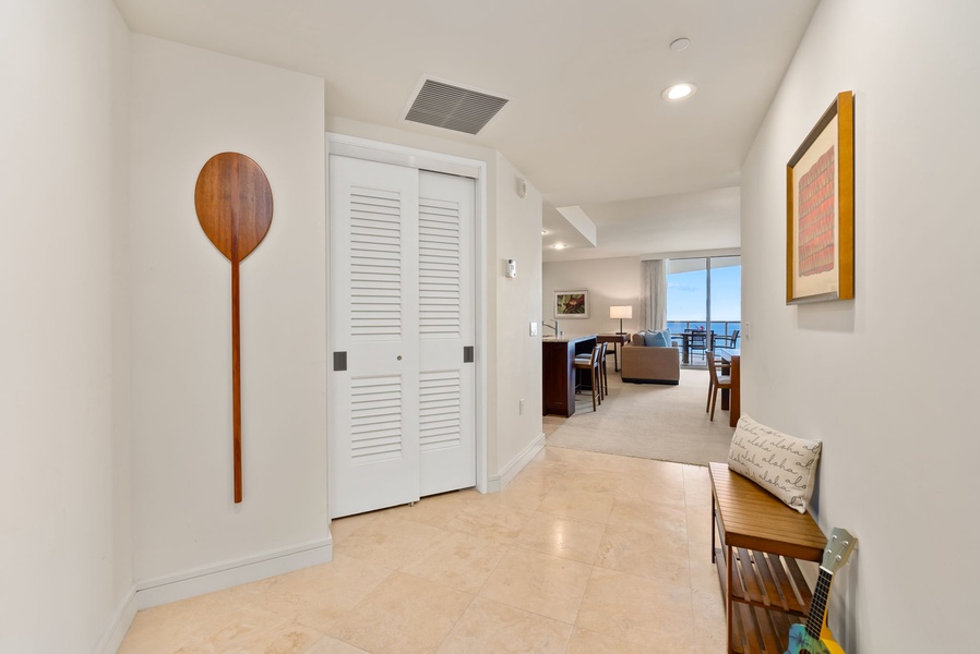 Inviting entryway that opens up to a bright and spacious living area with ocean views.