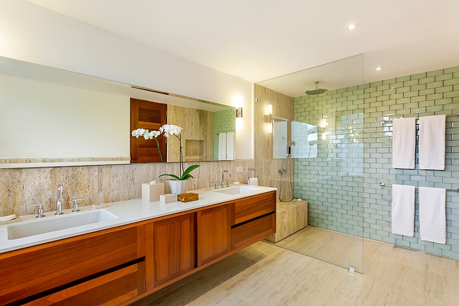 The expansive ensuite bathroom has dual vanities and separate shower.