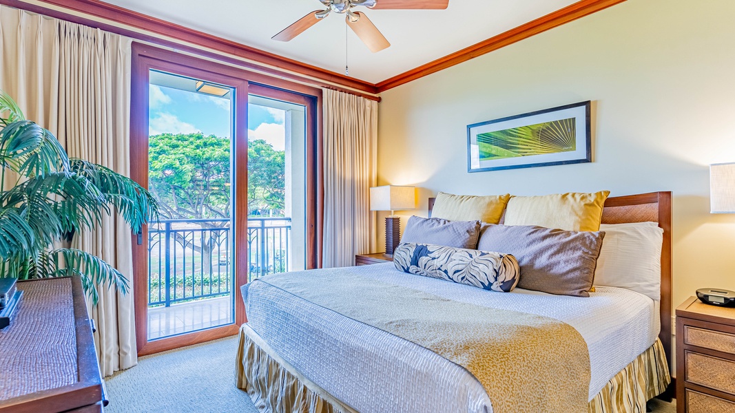 The primary guest bedroom with a king bed and access to the lanai.