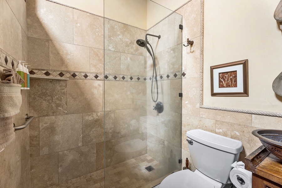 Contemporary guest bath with clean lines and warm textures—ideal for second-floor bedrooms.