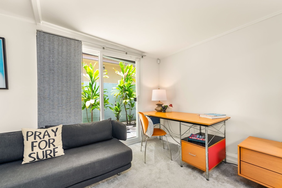 Settle into this bright workspace with your morning coffee, or unwind on the sofa with garden views framing your quiet retreat.