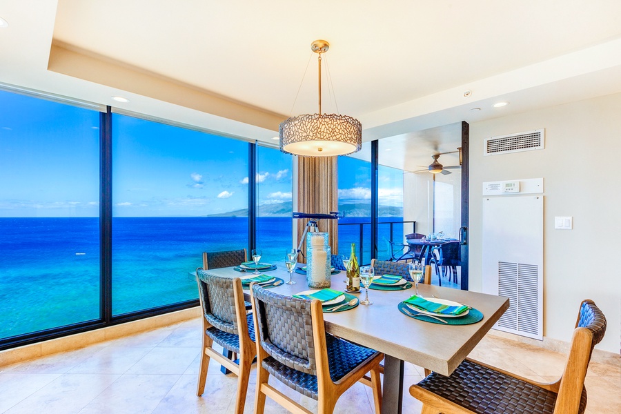 Dining area with open-concept design and panoramic views of the ocean.