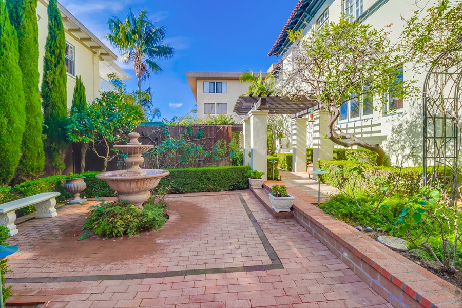 Take a leisurely stroll by the serene fountain in the courtyard, where tranquility and beauty intertwine.