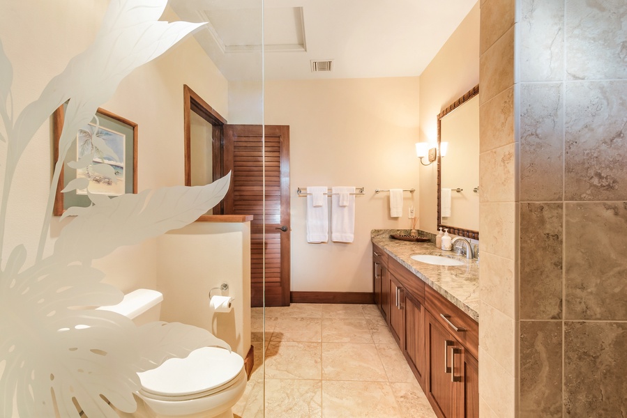 Downstairs Primary Bath w/ Large Glass Enclosed Shower and Dual Sinks