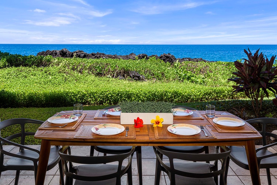 Savor al-fresco dining at the lanai, where the gentle breeze complements every bite under the starlit sky.