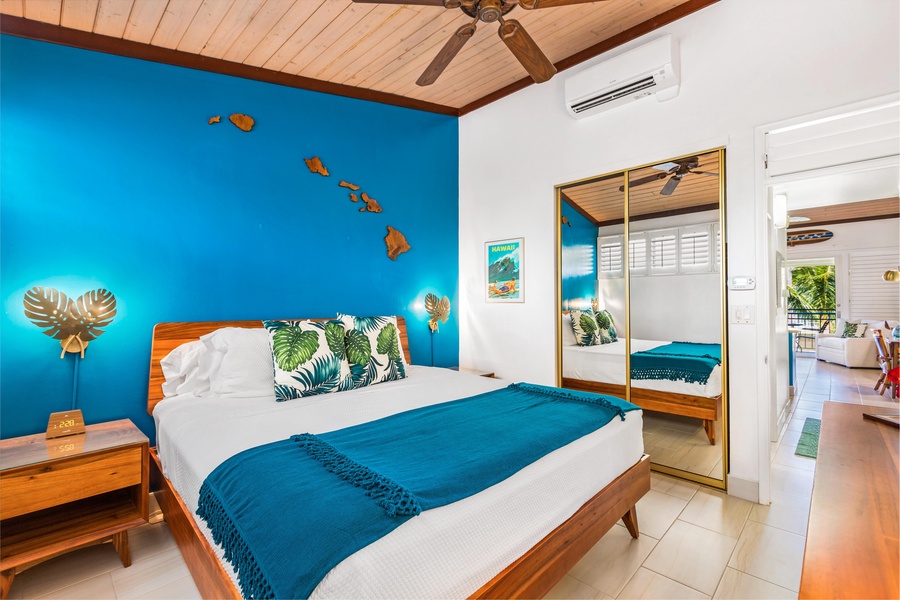 Napili Shores F-252’s bedroom features new AC and bold island colors for cool, restful nights.