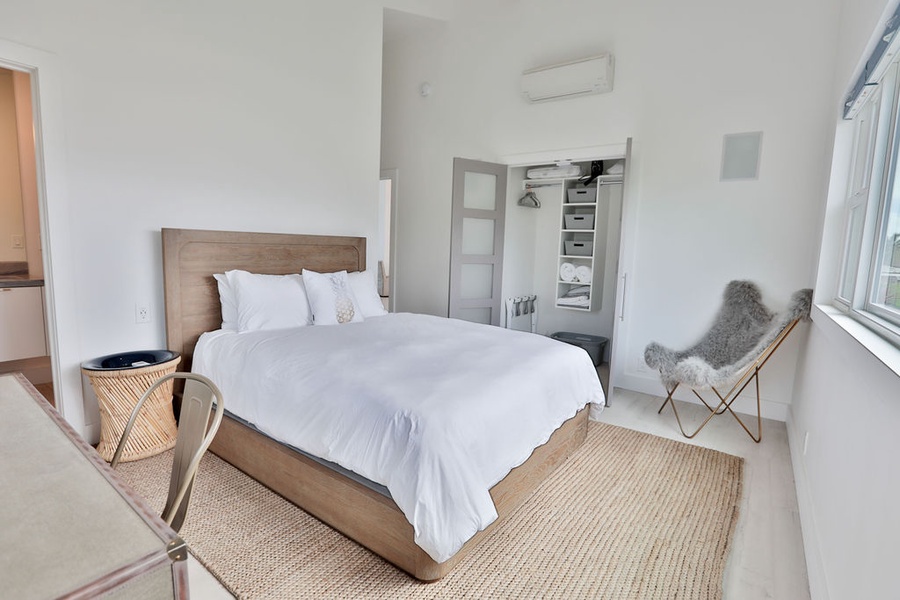 3rd Guest Bedroom featuring split AC and standard closet space