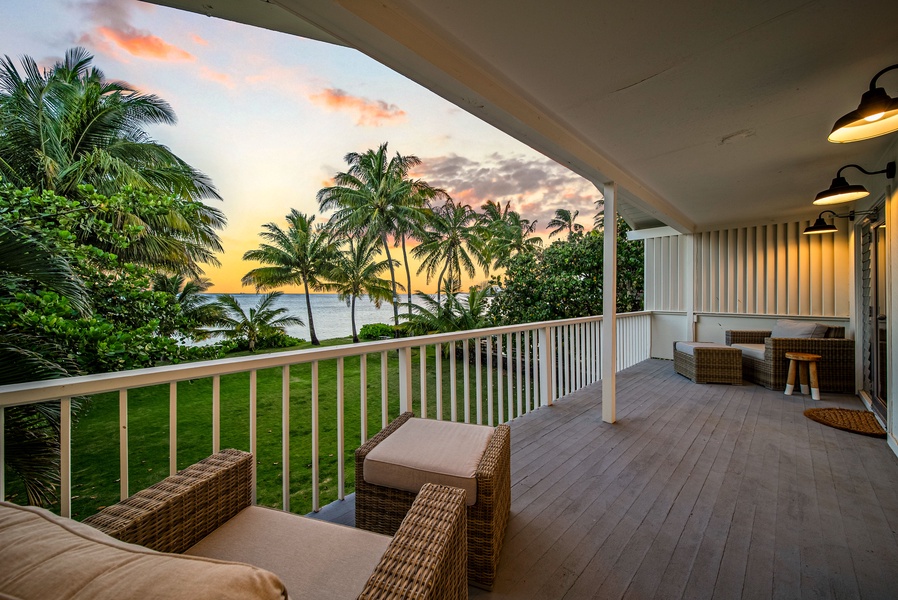 Covered lanai with ocean views, perfect for breezy mornings.
