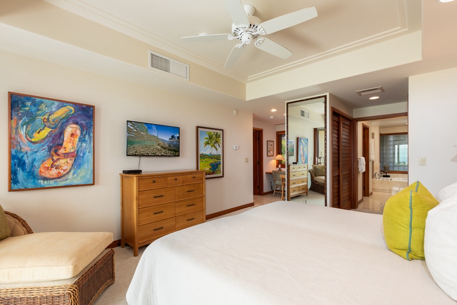 Wind down with tropical artwork, ample cooling, and TV for ultimate comfort and relaxation.