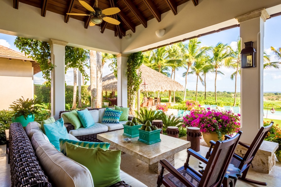 Cozy outdoor seating with garden views.