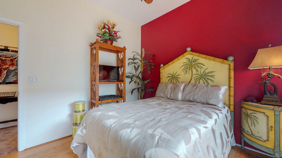 The downstairs guest bedroom with a queen bed.