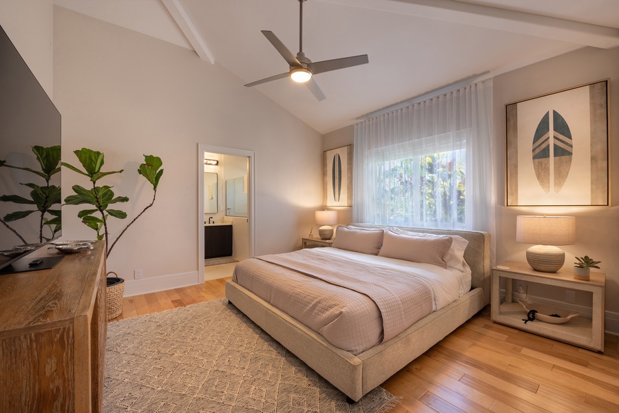 Stylish guest bedroom with a king-size bed and charming decor.