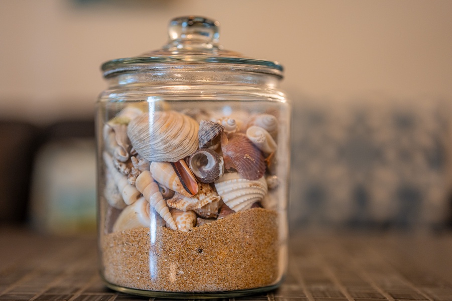 A jar of treasured seashells.