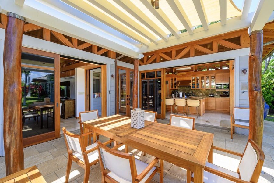 Enjoy seamless indoor-outdoor living with covered lanais and floor-to-ceiling sliding doors.