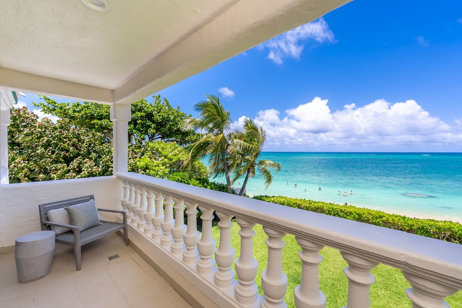 Step out from your bedroom onto a private lanai overlooking turquoise waters and palm-lined shores.
