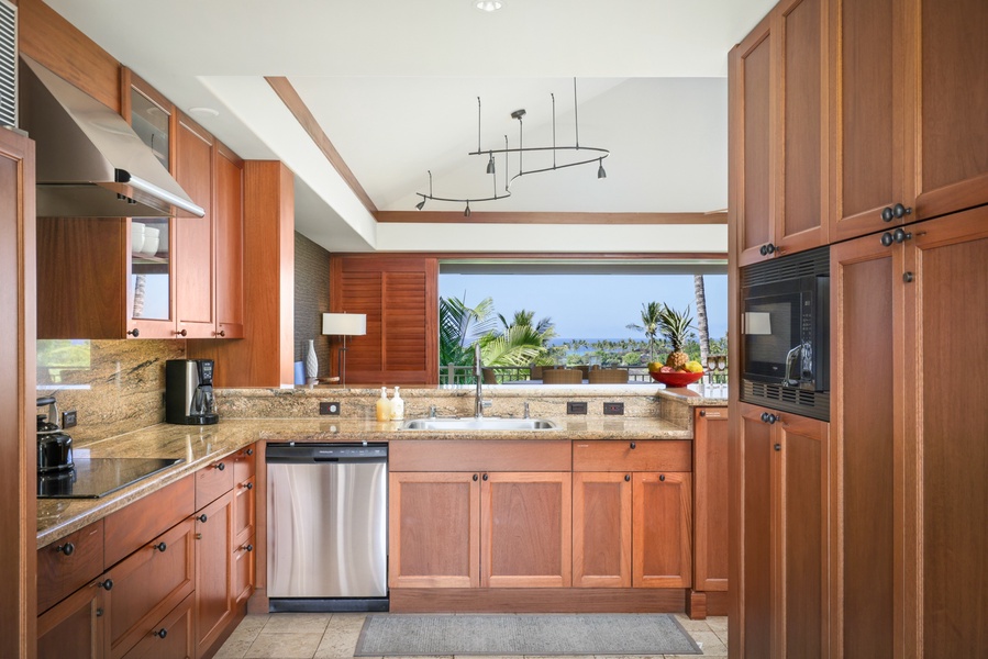 Smooth wood cabinetry and exquisite views - a chef’s delight!