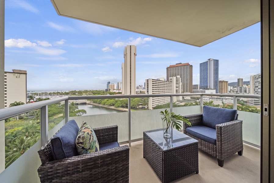 Enjoy a cup of coffee and the the panoramic city views from the lanai.