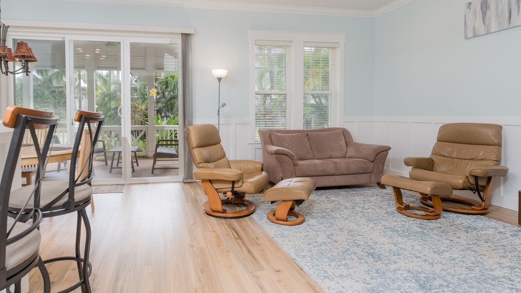 Sink into the plush seating in the living area surrounded by natural wood tones.