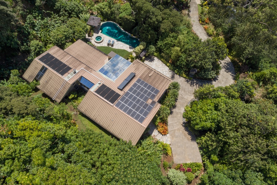 Bird’s-eye view of the solar-powered estate, pool, and gardens—all tucked into a pristine 9-acre sanctuary.