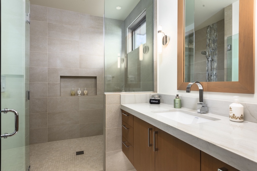 Ensuite bathroom three has large walk-in shower.