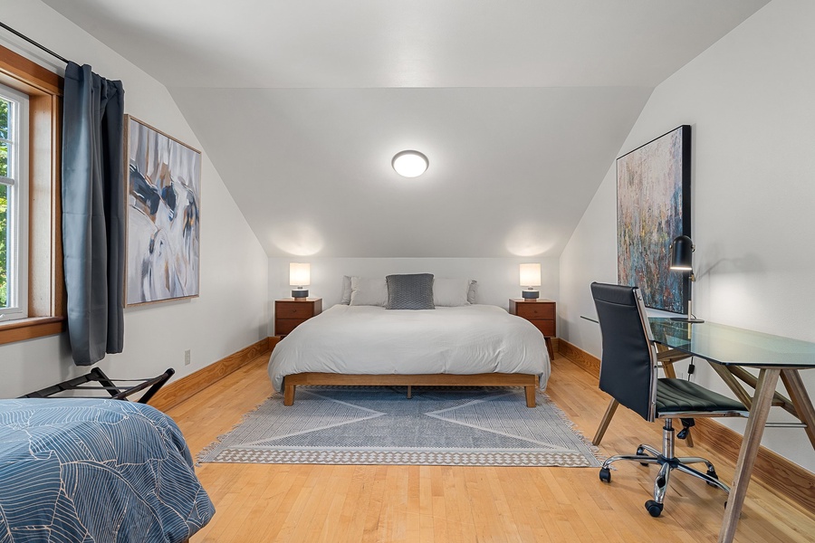 The guest suite comes with a king bed, extra twin bed and a home office provision